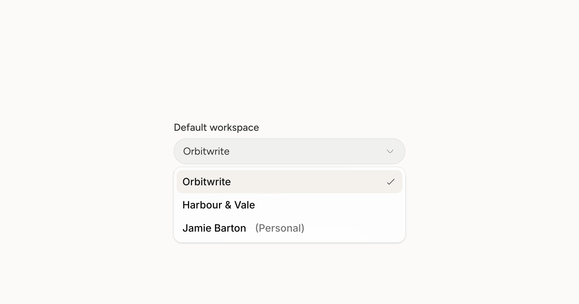 The Default workspace setting in account settings, open on the three workspaces this account holds with the personal one marked