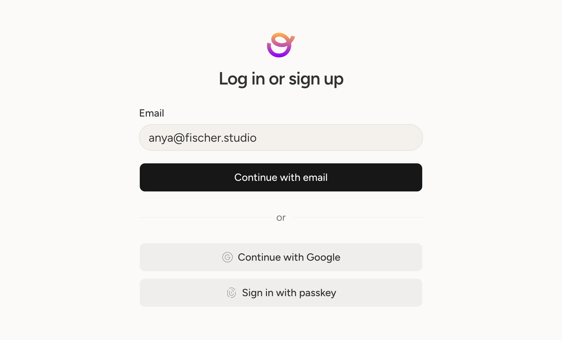 The sign-in screen with Continue with Google above the passkey button